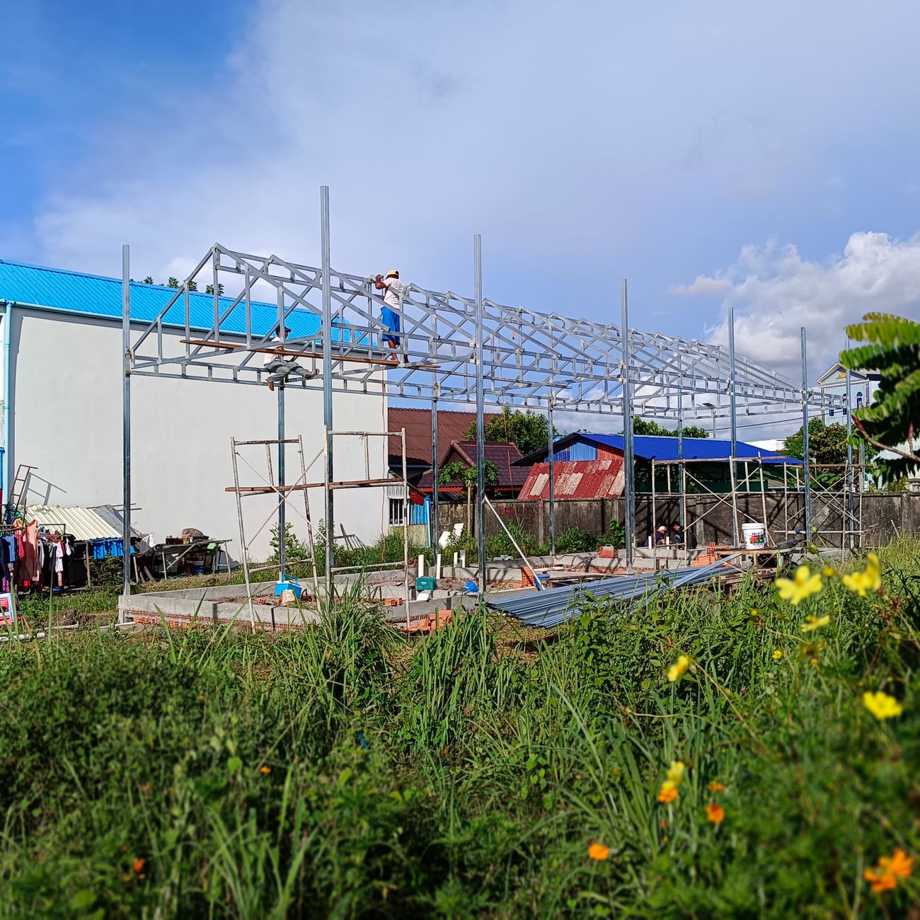 Construction site with a crane and unfinished building